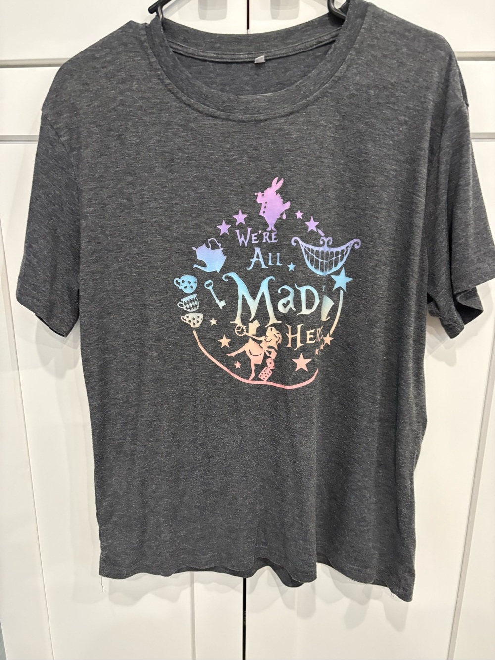 Women's Gray 'We're All Mad Here' Short Sleeve Tee - Pastel Graphic